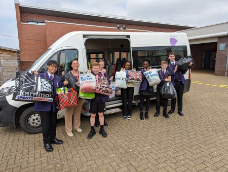 Students with donations for MK Storehouse
